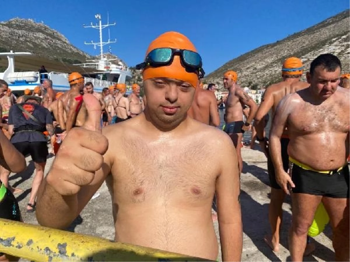 Down sendromlu sportmen Gökhan Kotan, dünyada birinci defa açık suda 7 kilometre yüzerek bir birincisi gerçekleştirdi